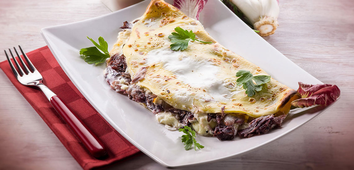 Savoury pancakes with radicchio and Monte Veronese cheese